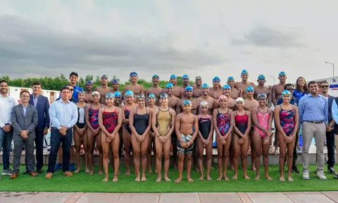 The athletes and the dignitaries pose for a picture after the launch program