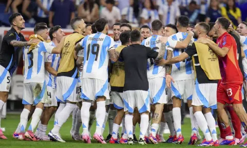 Players of Argentina celebrate defeating Ecuador in a penalty shootout in a Copa America Quarterfinal soccer match in Houston (AP)