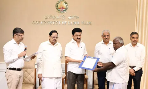 Chief Minister MK Stalin handing over orders to farmers and potters from Kancheepuram to take soil from water bodies at the Secretariat on Monday