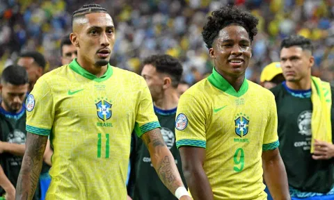 Brazil's Raphinha and Endrick leave the pitch after their team’s loss to Uruguay&nbsp;