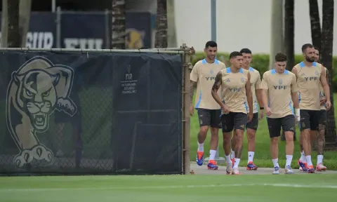 Argentina players arrive for a training session ahead of the final