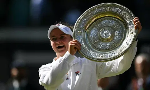 Barbora Krejcikova holds the winner's trophy

