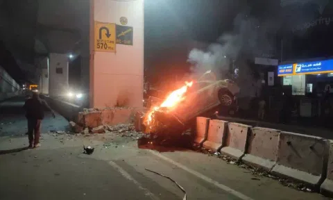 The car which went in flames following the mishap
