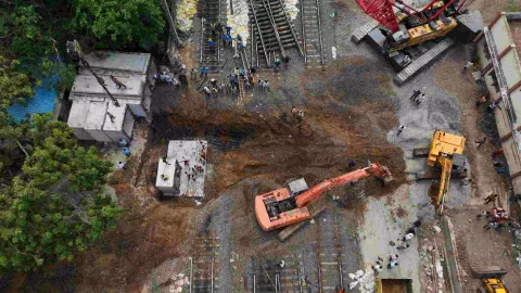 Heavy machineries engaged for insertion of pre-cast boxes for culvert