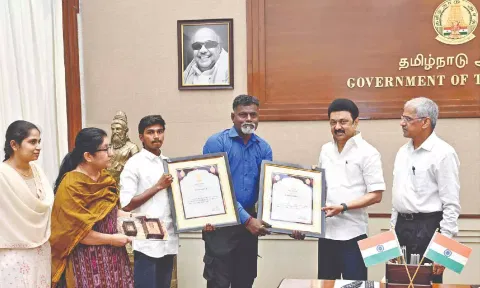 S Vijayakumar (L) and A Maria Michael, both from Thoothukudi, with Chief Minister MK Stalin