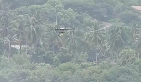 Video grab image of the drone deployed to deliver a food pack to the dog.