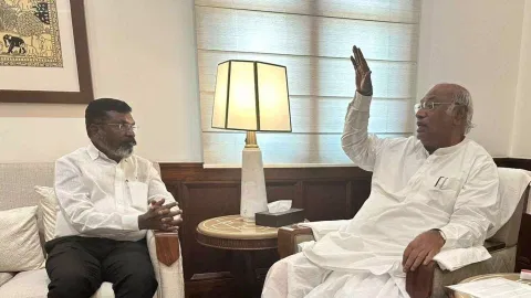 VCK chief Thol Thirumavalavan interacting with Congress president Mallikarjun Kharge in New Delhi on Friday&nbsp;