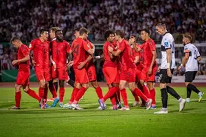 Players celebrating after victory