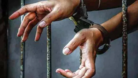 Person behind the bars&nbsp;