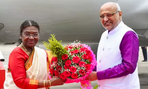 President Droupadi Murmu being welcomed by Governor of Maharashtra C.P. Radhakrishnan on her arrival in Kolhapur (PTI)