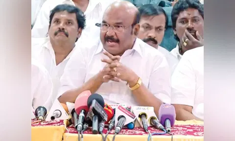 D Jayakumar talking to reporters