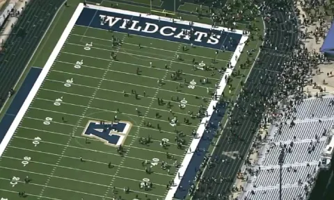 Students are evacuated to the football stadium after the school campus was placed on lockdown at Apalachee High School in Winder (AP)