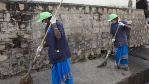 sanitary workers&nbsp;
