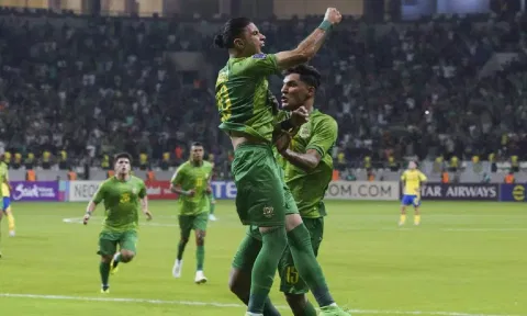 Mohammed Dawood celebrates after scoring a goal (AP)
