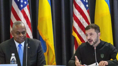 U.S. Defense Secretary Lloyd Austin, left, listens to Ukraine’s President Volodymyr Zelenskyy during a meeting at Ramstein Air Base (AP)