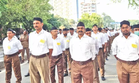 Union minister and BJP leader L Murugan taking part in the RSS route march at Rajarathinam Stadium in Chennai