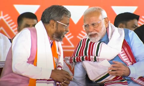 Prime Minister Narendra Modi with Jharkhand BJP President Babulal Marandi during a public meeting ahead of Jharkhand Assembly elections (PTI)