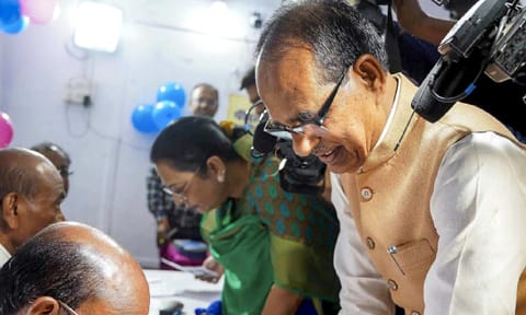 Union Minister Shivraj Singh Chouhan gets his finger marked with indelible ink before casting his vote during Budhni Assembly constituency bypoll, in Sehore district of Madhya Pradesh,&nbsp; (PTI Photo)&nbsp;