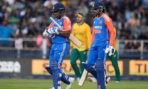 India's Sanju Samson, left, and his batting partner Tilak Varma walk between the wickets during the fourth T20 cricket match (PTI)&nbsp;