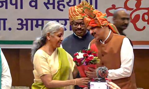 Union Finance Minister Nirmala Sitharaman felicitates BJP leader Devendra Fadnavis after he was unanimously elected as the Maharashtra BJP legislature party leader at its meeting, in Mumbai (PTI)&nbsp;