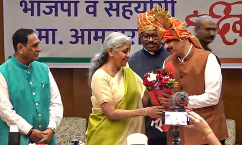 Union Finance Minister Nirmala Sitharaman felicitates BJP leader Devendra Fadnavis after he was unanimously elected as the Maharashtra BJP legislature party leader at its meeting, in Mumbai (PTI)&nbsp;