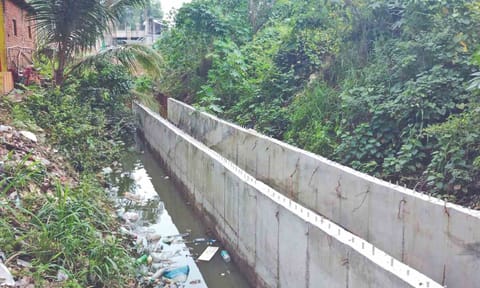 Residents say encroachment over the canal disrupts the flow of rain water, causing stagnation