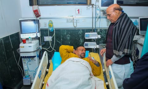 Defense Minister Rajnath Singh meets BJP MP Mukesh Rajput undergoing treatment at the RML Hospital after he got injured in clashes between INDIA Bloc and NDA MPs during protest at Parliament complex,&nbsp;in&nbsp;New&nbsp;Delhi (PTI)