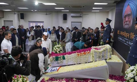 Congress President Mallikarjun Kharge and senior party leader Sonia Gandhi pay their last respects to former prime minister Manmohan Singh (PTI)