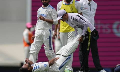 India's Rishabh Pant receives treatment after he was hit while batting during play on the first day of the fifth Test (AP)&nbsp;