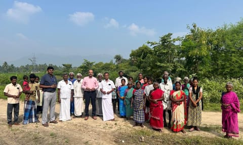 Agri chamber chief Rethinavelu with some of the Nayakkarpatti villagers&nbsp;near&nbsp;Melur
