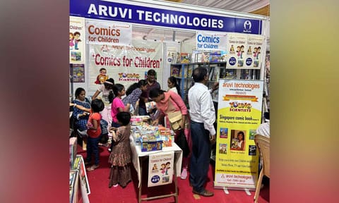 Comic book stalls are crowded with children and parents