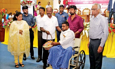 Health Minister Ma Subramanian, Mayor Priya at an event handing over insurance claim&nbsp;&nbsp;