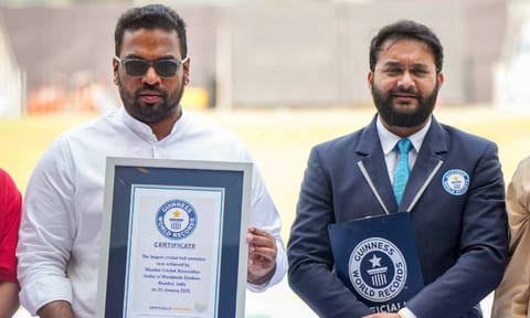 Mumbai Cricket Association President Ajinkya Naik receives the certificate of the Guinness World Record for the largest cricket ball sentence at Wankhede Stadium (PTI)
