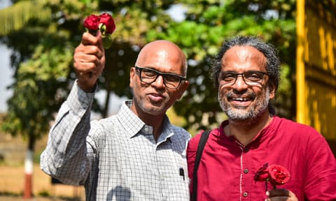 Researcher Rona Wilson, right, and activist Sudhir Dhawale, left, accused in the Elgar Parishad-Maoist links case, after being released on bail from a Navi Mumbai prison, more than six years after they were arrested, Friday, Jan. 24, 2025 (PTI)&nbsp;