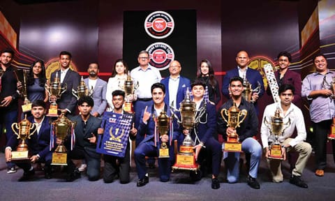 The 2024 National Racing champions with Arun Mammen, Vice-Chairman and Managing Director, MRF Ltd (fifth from right) and MMSC president Ajit Thomas (sixth from left)&nbsp;