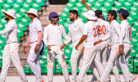 Vidarbha's Parth Rekhade celebrates with teammates after taking the wicket of Mumbai's Suryakumar Yadav during the second day of a Ranji Trophy semi-final cricket match between Mumbai and Vidarbha (PTI)