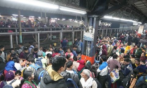 &nbsp;Heavy rush of passengers to catch a train for Mahakumbh, at the New Delhi railway station (PTI)