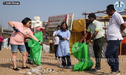 Environment Secretary Supriya Sahu&nbsp; &amp; Australian Consul-General Silai Zaki volunteered to pick up litter from Chennai's Elliot's Beach (Justin George)&nbsp;