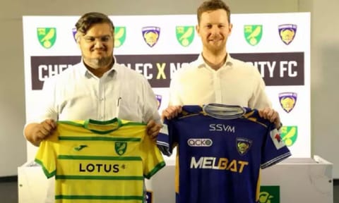Ekansh Gupta, VP Chennaiyin FC and Sam Jeffery from Norwich pose with club shirts&nbsp;