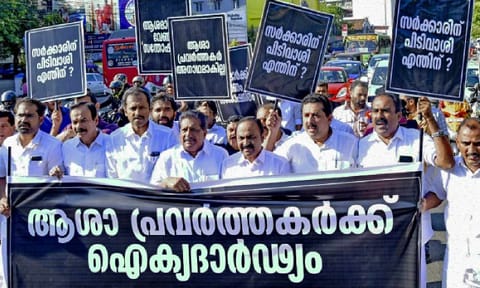 Leader of Opposition V.D. Satheesan (fourth from right) and other UDF MLAs take part in a protest march in support of ASHA workers, in Thiruvananthapuram on Thursday (PTI)