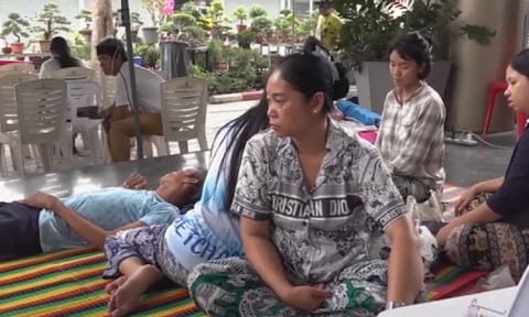 Families awaits news of missing workers at site of Bangkok building collapse