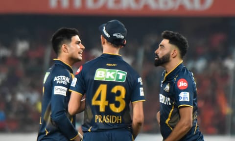 Gujarat Titans' captain Shubman Gill with teammates Prasidh Krishna and Mohammed Siraj during the Indian Premier League (IPL) 2025 (PTI)