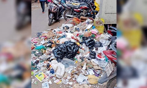 Heaps of garbage lying uncleared on a street in Park Town