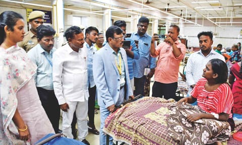 NCSC director Ravivarman inquiring with Menaka who had also consumed poison at Nadukaveri police station