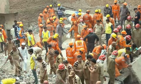 Rescue operation underway after a four-storey building collapsed trapping several people, in Dayalpur area of New Delhi, early Saturday, April 19, 2025 (PTI)