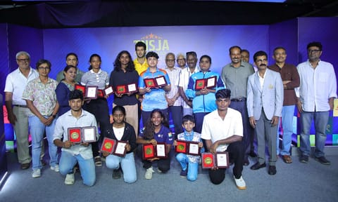 TNSJA award winners at the event with the chief guests onstage&nbsp;
