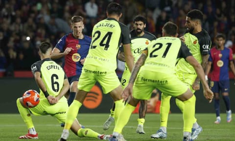 Dani Olmo shoots to score against Mallorca