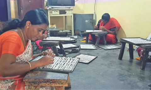 Silversmiths making anklets at a workshop in Salem&nbsp;