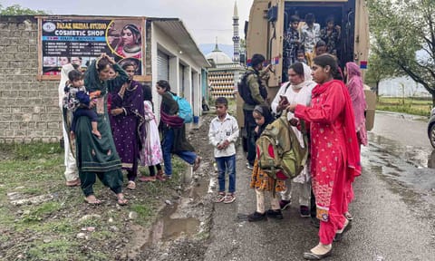 People from border areas shift to safer place following shelling by Pakistani troops, at Mendhar in Poonch, Friday, May 9 (PTI)&nbsp;