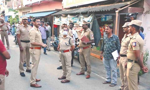 Police inquiring at the murder spot on Sunday